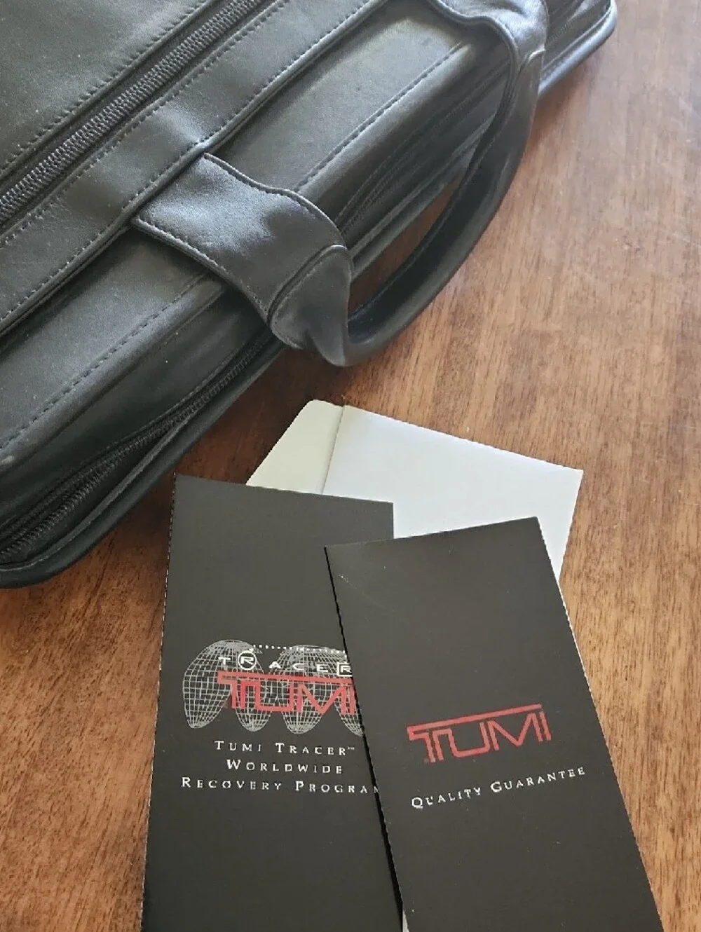 Tumi Black Leather Two-Compartment Briefcase with ID Tag